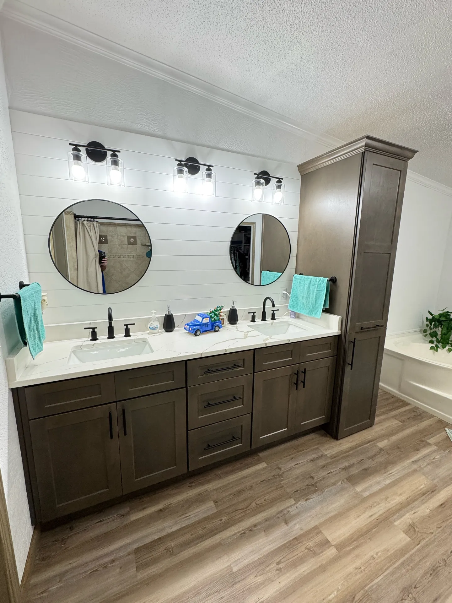 Master bath vanity with tall linen cabinet